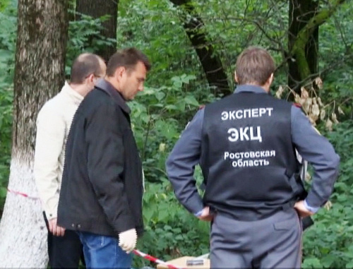 Investigating group at the spot of the skirmish with a gang that committed attacks on policemen. The city of Aksai, Rostov Region, September 8, 2013. Snapshot of a footage by the press-cutting service of the Russian Ministry of Internal Affairs (MIA) for the Rostov Region