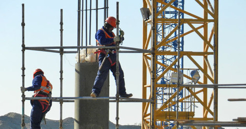 Workers at the building site of ‘Volgograd Arena’ Stadium. Photo by Tatiana Filimonova for the ‘Caucasian Knot’. 