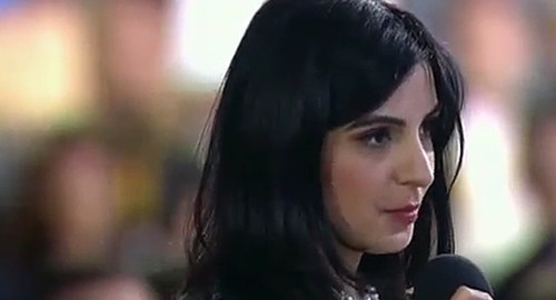 Diana Khachatryan at Vladimir Putin's press conference. Screenshot of the video 'Putin's press conference. Question of Diana Khachatryan', http://www.novayagazeta.ru/tv/topics/61537.html