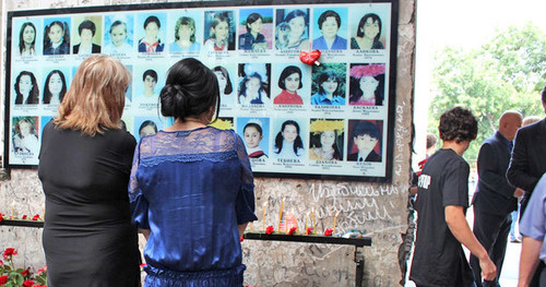 Photos of the terror act victims on the wall of the gym at school No. 1. Beslan. Photo by Emma Marzoeva for the "Caucasian Knot"