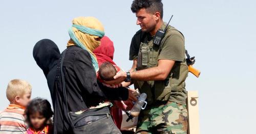 Woman with children, Iraq. Photo: REUTERS/Ako Rasheed