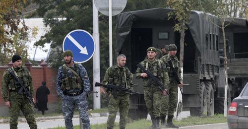 Law enforcers. Photo: REUTERS/Alkhan Gargayev