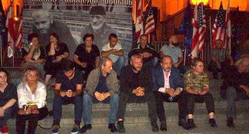 Zaza Saralidze (fourth from the right) on the steps in front of the Georgian parliament. Photo by Beslan Kmuzon for the Caucasian Knot