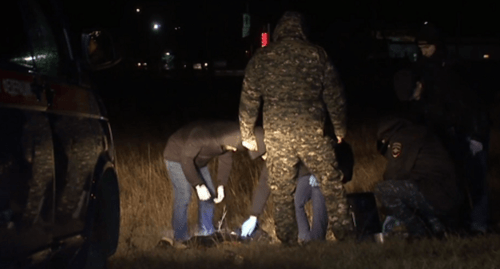 Law enforcers at the site of the woman's suicide bombing in Grozny on November 17, 2018. Screenshot of the video "A woman blew herself up in Grozny" https://www.youtube.com/watch?v=lSokS4qAbtM"