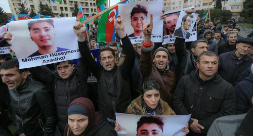 Participants of the oppositional rally hold posters with Mekhman Guseinov's photo. Baku, March 10, 2018. Photo by Aziz Karimov for the "Caucasian Knot"