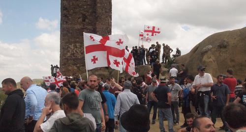 Participants of the action near the church in Chichkhituri. Photo by Beslan Kmuzov for the "Caucasian Knot"