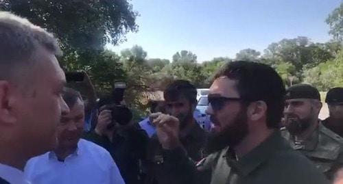 Magomed Daudov (on the right) at the meeting with Alexander Pogorelov (in the center). June 11, 2019. Photo: screenshot of the video https://www.youtube.com/watch?v=7AjvDJqqQy