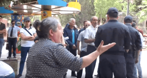 Women shout at the police officers who dispersed the protest action. Screenshot of the video https://youtu.be/aFypV9Rdm3E