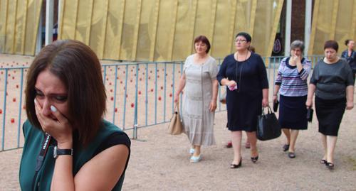 People leaving the gym of the Beslan school. Photo by Alan Tskhurbaev for the Caucasian Knot