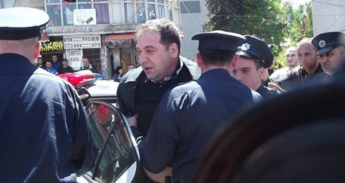 Police detaining Bezhan Gunava, August 25, 2020. Photo courtesy of press service of 'Free Georgia'