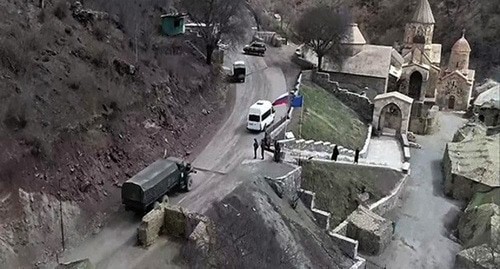 Pilgrims, accompanied by peacekeepers,  inside the monastery. Photo by the Russian Ministry of Defence http://mil.ru/russian_peacekeeping_forces/news/more.htm?id=12350121@egNews