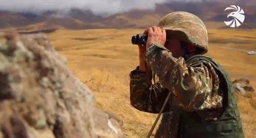 An Armenian soldier at a combat post. Screenshot of video posted by the Ministry of Defence of Armenia, http://mil.am/hy/news/9921