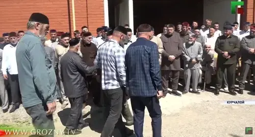 The ceremony of reconciliation of warring families in the Kurchaloi District of Chechnya. Screenshot of the video by the "Grozny" TV Channel https://www.youtube.com/watch?v=-Ed2s6tTdgQ