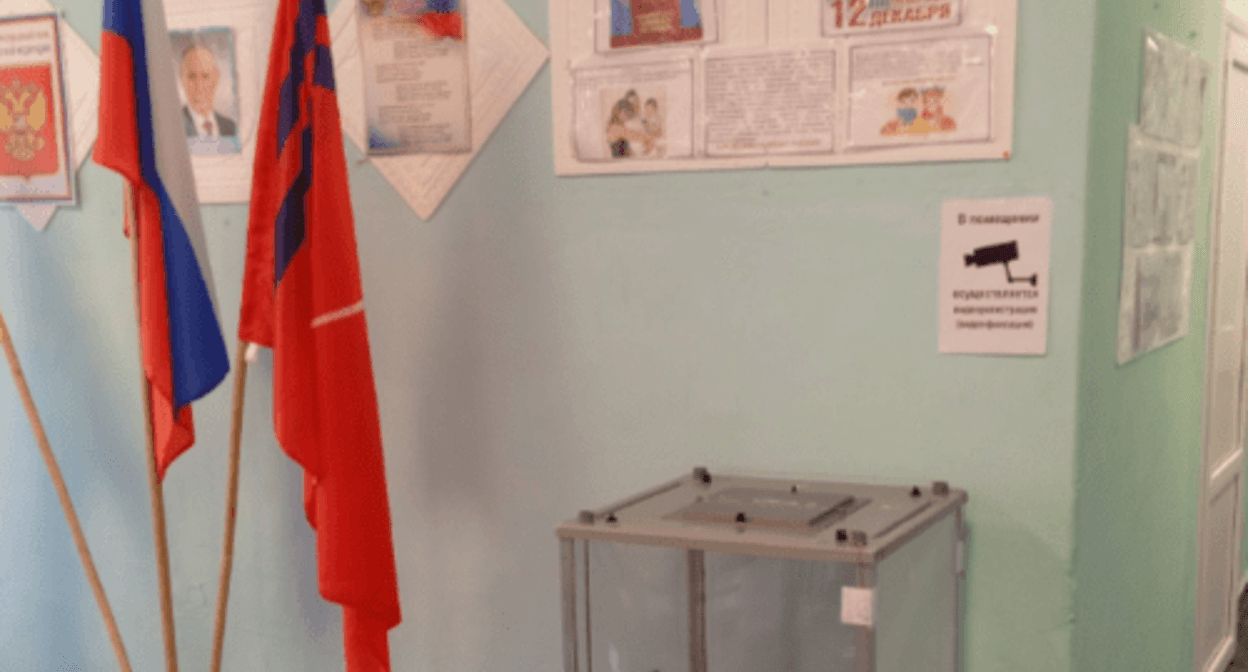 Portrait of Putin hang near the ballot box in the Nekhaevskaya village. Screenshot of the photo posted on Galina Bratashova's page on the VKontakte on March 15, 2024 https://vk.com/id414606567?z=photo414606567_457239111%2Fphoto_feed414606567