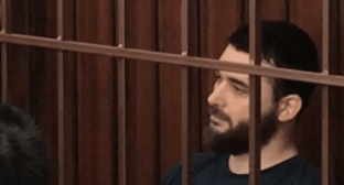 Abdulmumin Gadjiev at a court. Screenshot of the video posted on the YouTube channel "ALif TV" https://www.youtube.com/watch?v=M-pR5mx7jFs