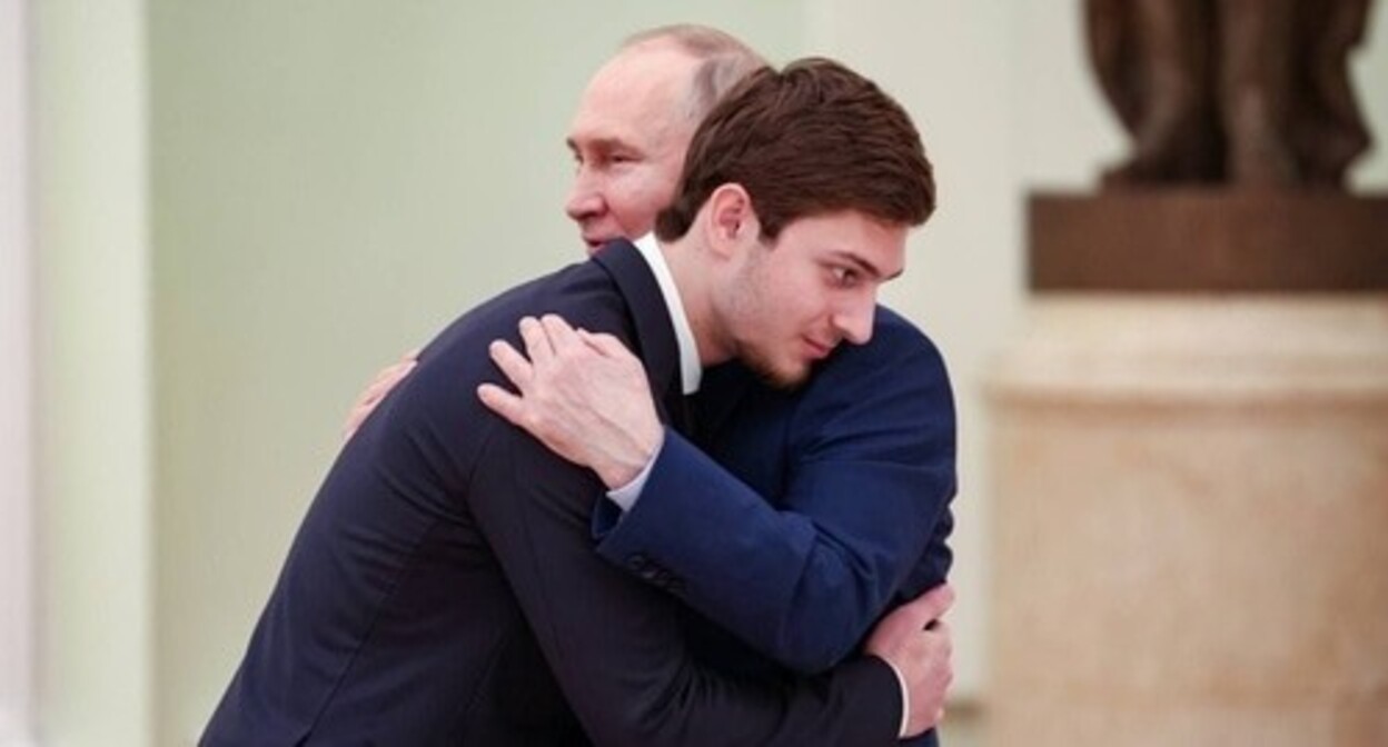 Vladimir Putin and Ali Kadyrov. Photo from Ramzan Kadyrov's Telegram channel https://t.me/RKadyrov_95/4837