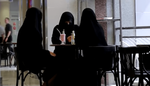 Girls wearing niqabs. Screenshot of a video posted on the YouTube channel Onliner.by on August 9, 2013 https://www.youtube.com/watch?v=k3xfw74bXjs