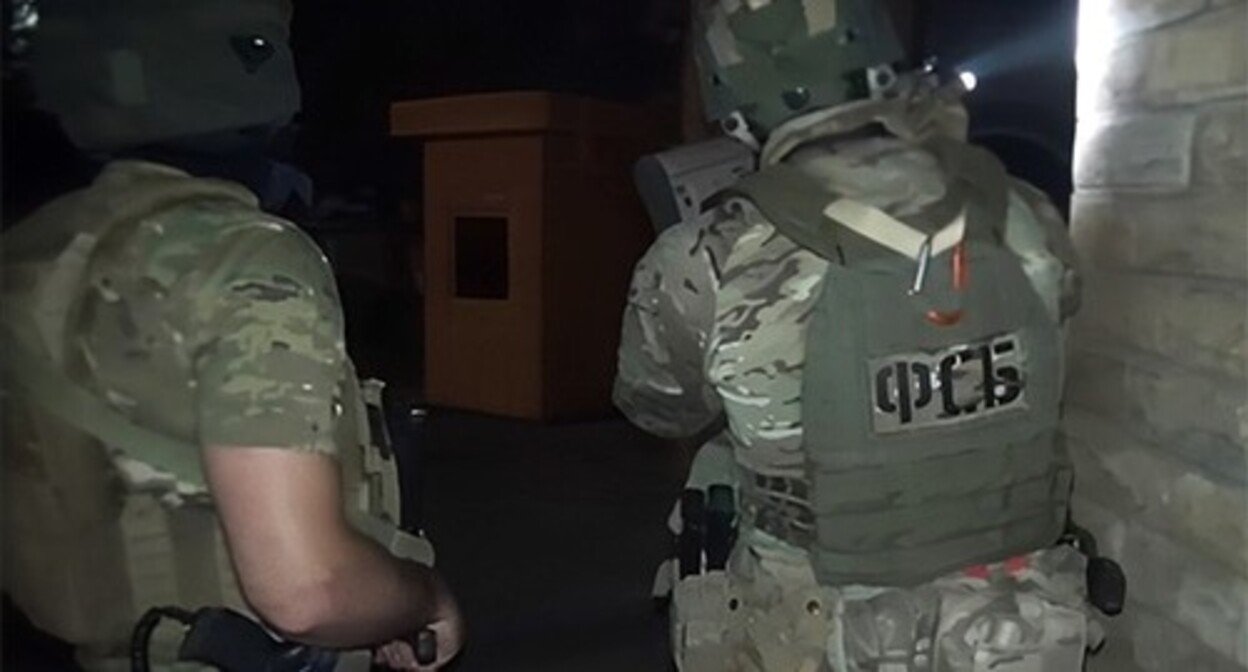 Law enforcers at the scene. June 2024. Screenshot of a video by the Russian FSB