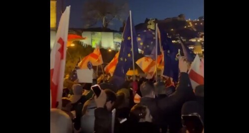 The marchers with the flags of Georgia and European Union. Tbilisi, February 15, 2025. Screenshot of a video by Lorena Beria / Tbilisi life https://t.me/Tbilisi_life/37112 The marchers with the flags of Georgia and European Union. Tbilisi, February 15, 2025. Screenshot of a video by Lorena Beria / Tbilisi life https://t.me/Tbilisi_life/37112