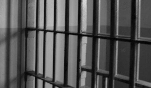 Prison bars. Photo: https://blkoutuk.com/wp-content/uploads/2015/10/csc_0110-scaled.jpg Prison bars. Photo: https://blkoutuk.com/wp-content/uploads/2015/10/csc_0110-scaled.jpg