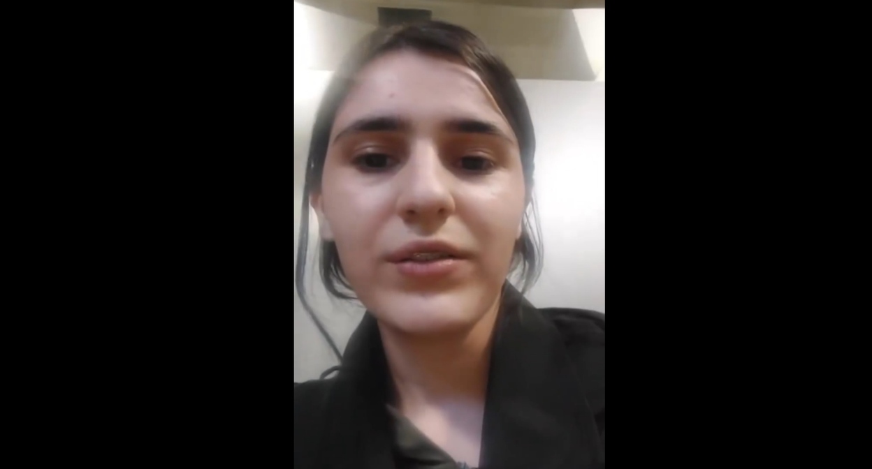 A still from Aishat Khizrieva's video message about leaving Russia: https://t.me/marem_group/1658 A still from Aishat Khizrieva's video message about leaving Russia: https://t.me/marem_group/1658